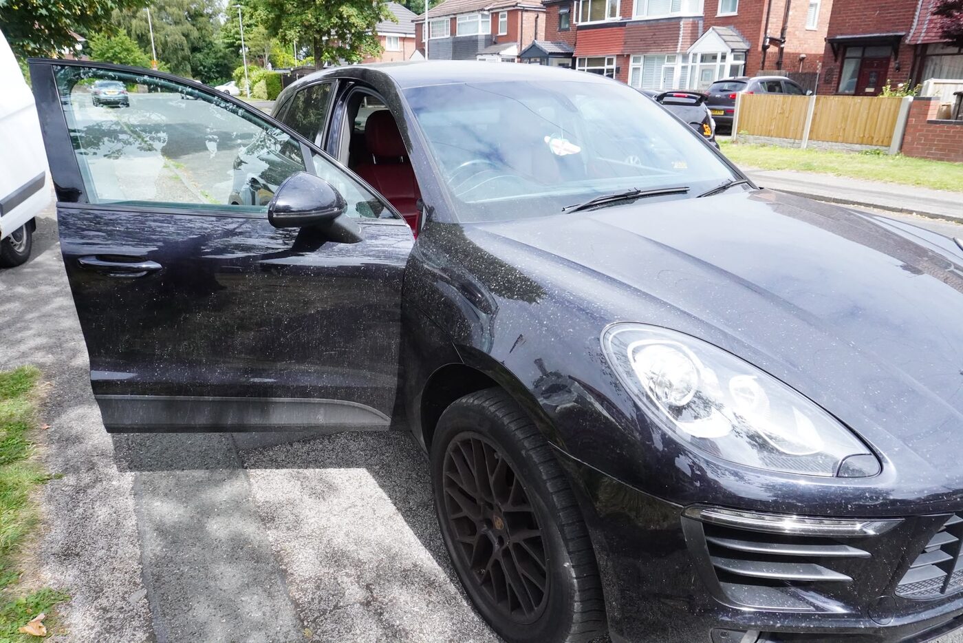 Porsche Macan before cleaning — dust and water spotting